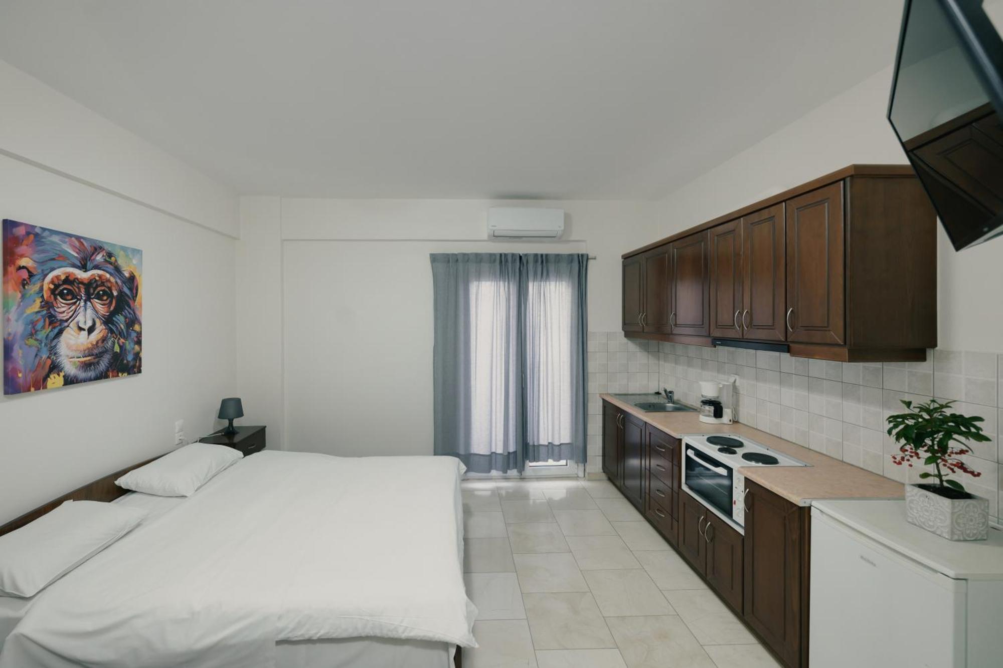 O Fotis Studios & Apartments อิโออันนินา ภายนอก รูปภาพ
