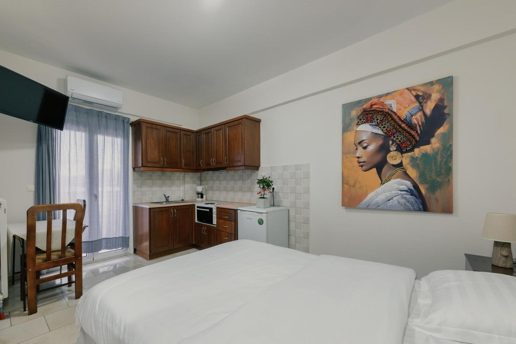 O Fotis Studios & Apartments อิโออันนินา ภายนอก รูปภาพ