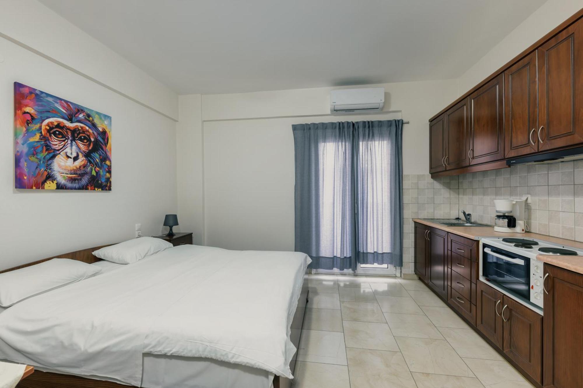 O Fotis Studios & Apartments อิโออันนินา ภายนอก รูปภาพ
