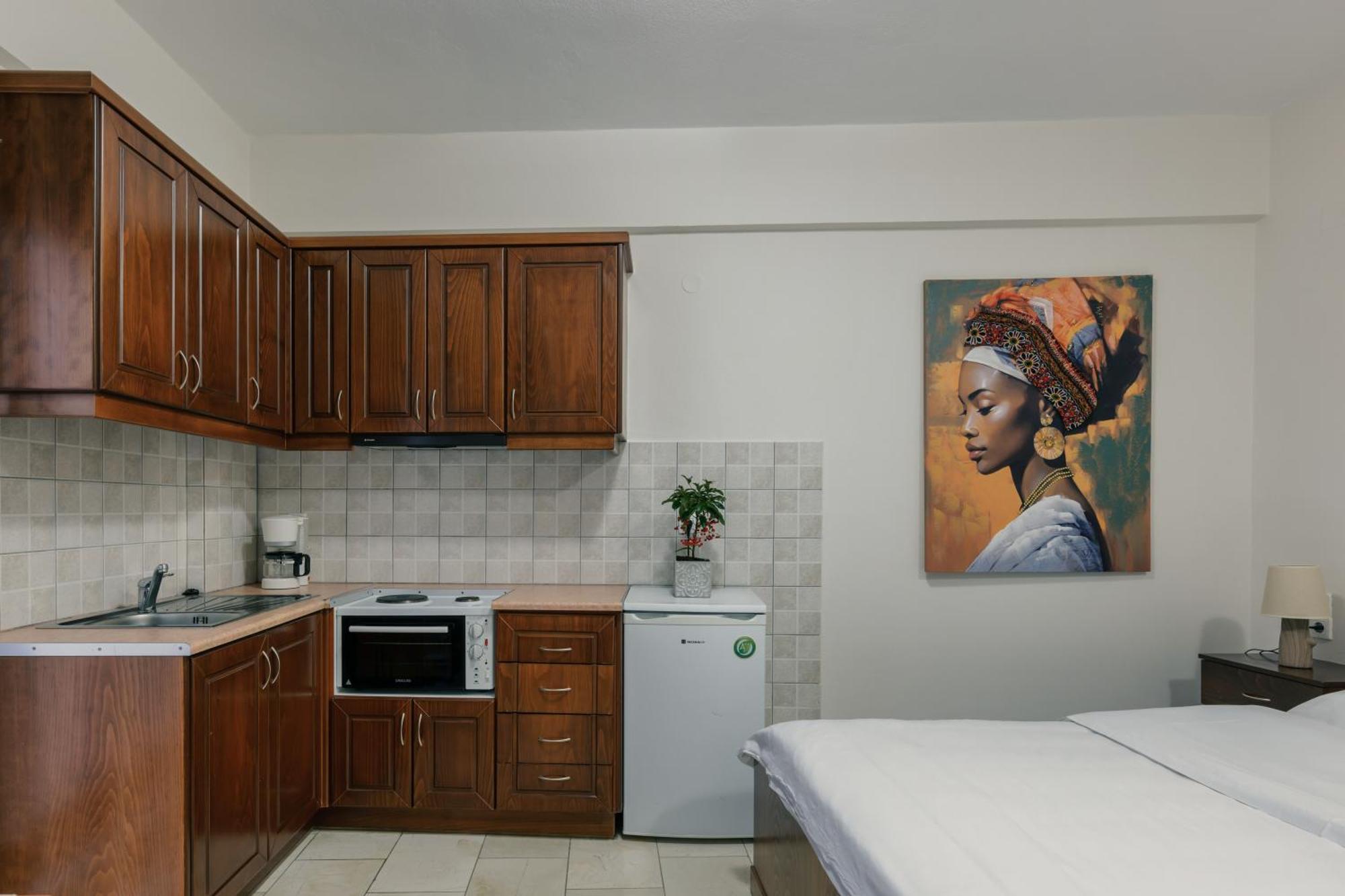 O Fotis Studios & Apartments อิโออันนินา ภายนอก รูปภาพ