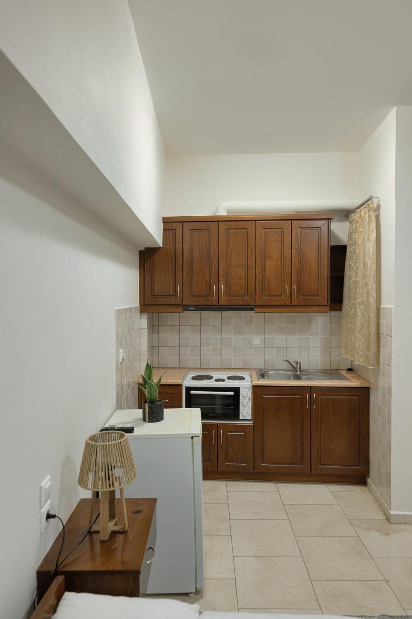 O Fotis Studios & Apartments อิโออันนินา ภายนอก รูปภาพ