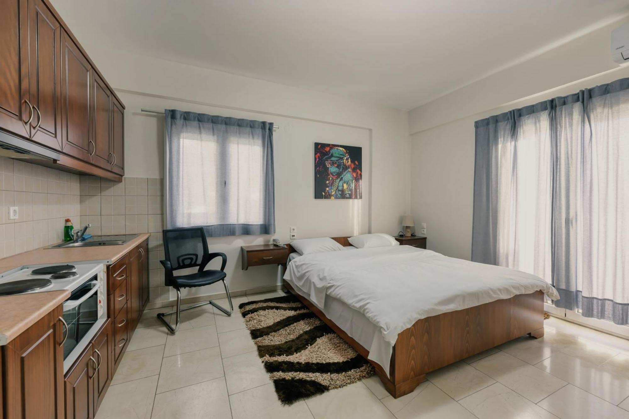 O Fotis Studios & Apartments อิโออันนินา ภายนอก รูปภาพ